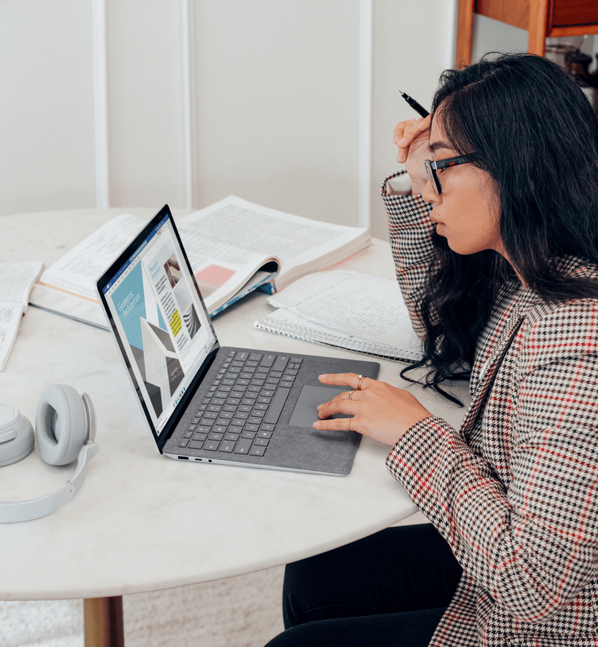 International business loans underwriter reviewing submitted business documents for approval