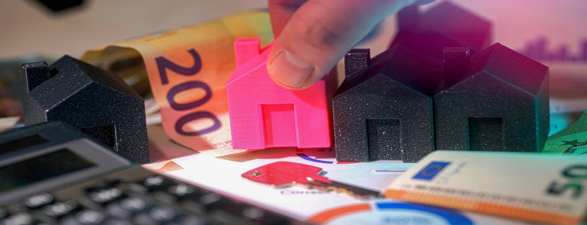 Toy house placed on a euro banknote representing business loans in Netherlands